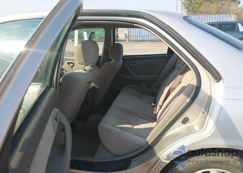 1999 Toyota Camry Le z USA, uszkodzony, nr VIN 4T1BG22K4XU593052